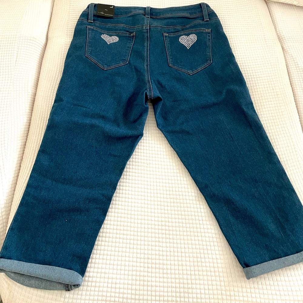 Capri stretch jeans w/ silver hearts. New w/ tags.